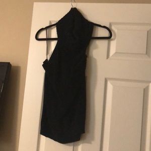 Black sleeveless turtleneck sweater